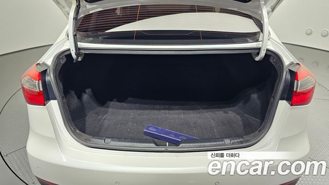 Kia K3 2013 — photo 23