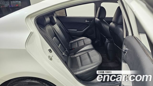 Kia K3 2013 — photo 24
