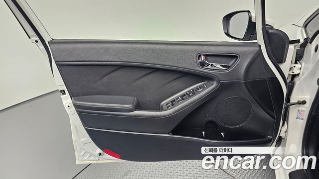 Kia K3 2013 — photo 14