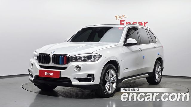 BMW X5 2015 — photo 1
