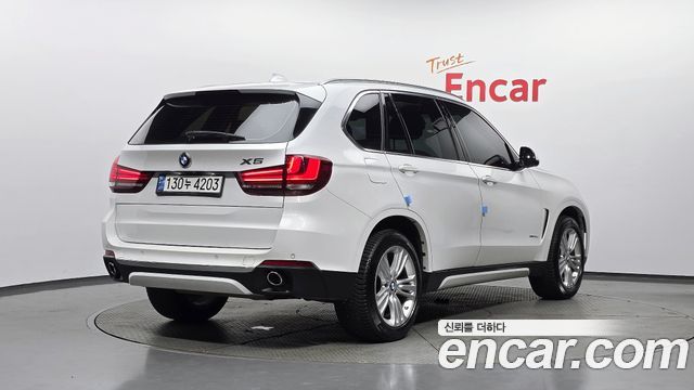 BMW X5 2015 — photo 2