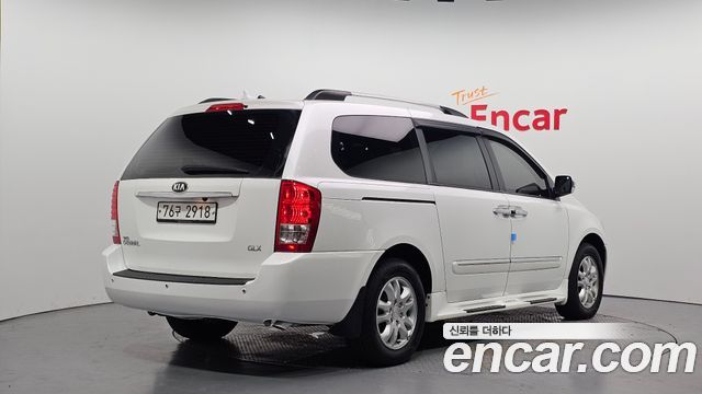Kia Canival 2013 — photo 2