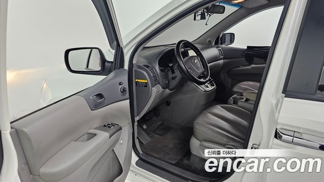 Kia Canival 2013 — photo 13