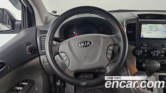 Kia Canival 2013 — photo 19