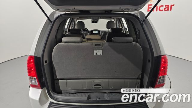 Kia Canival 2013 — photo 26