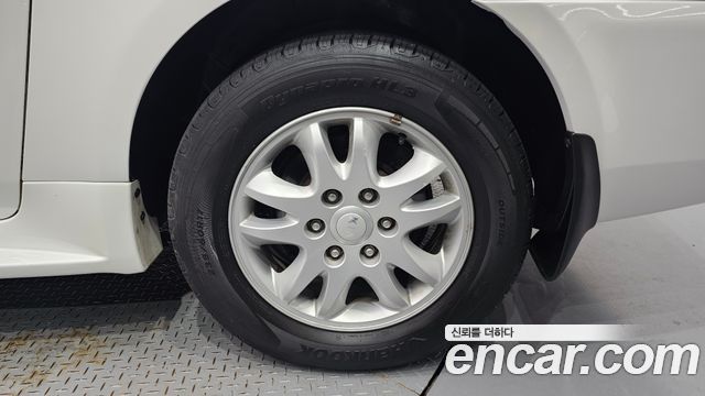 Kia Canival 2013 — photo 7