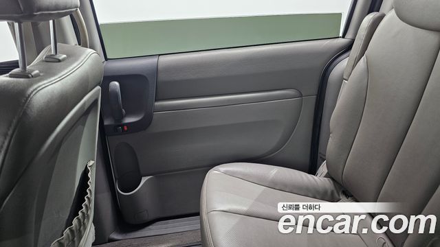 Kia Canival 2013 — photo 15