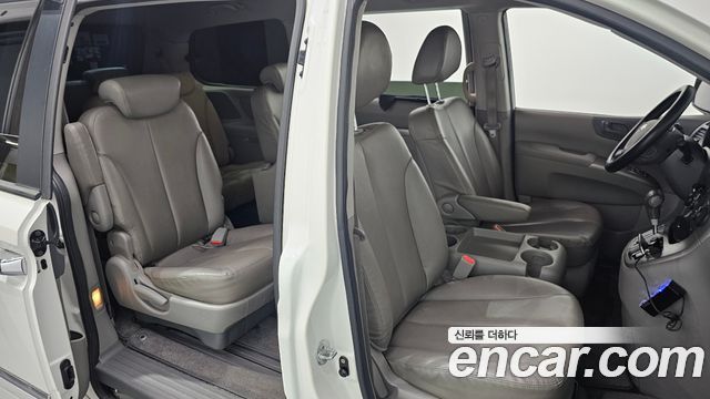 Kia Canival 2013 — photo 16