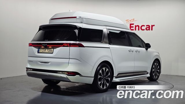 Kia Canival 2023 — photo 2
