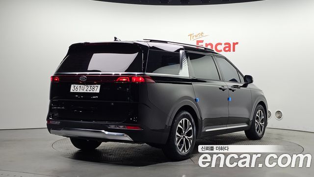 Kia Canival 2021 — photo 2