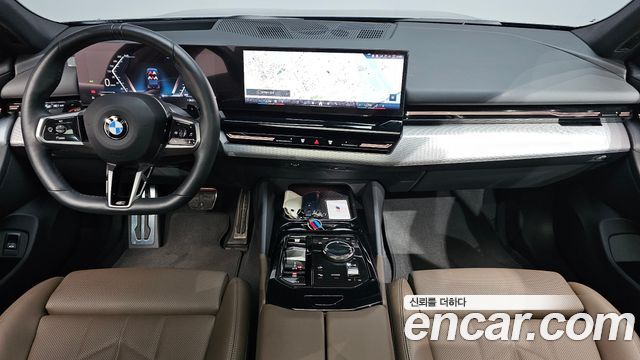 BMW 5-Series 2024 — photo 10