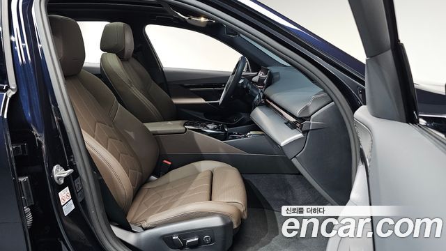 BMW 5-Series 2024 — photo 16