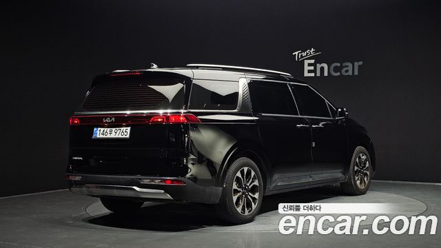 Kia Canival 2023 — photo 2