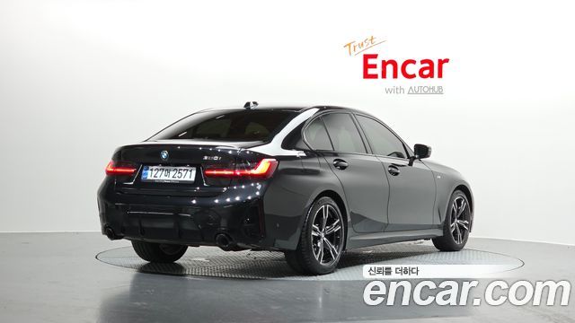 BMW 3-Series 2024 — photo 2