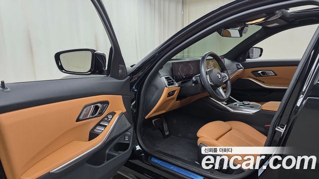 BMW 3-Series 2024 — photo 13