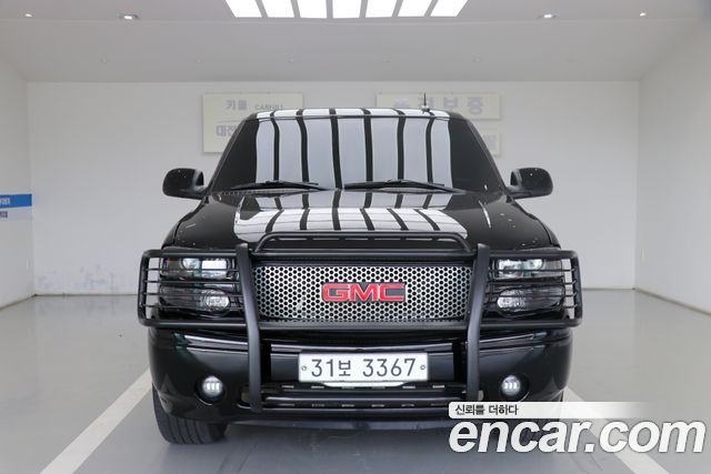 GMC Yukon 2003 — photo 2