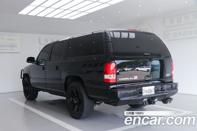 GMC Yukon 2003 — photo 6