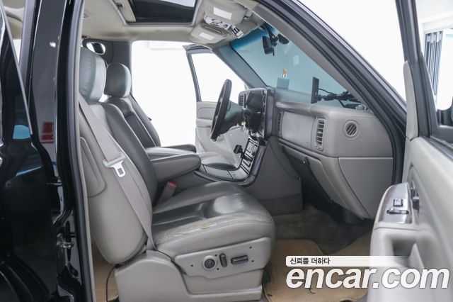 GMC Yukon 2003 — photo 13