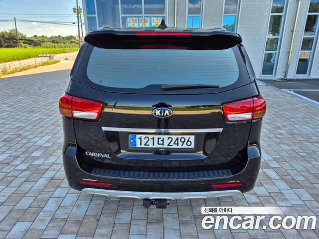 Kia Canival 2015 — photo 2