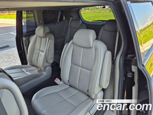 Kia Canival 2015 — photo 16