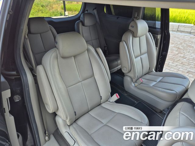 Kia Canival 2015 — photo 17