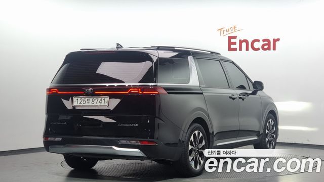 Kia Canival 2021 — photo 2