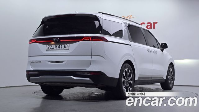Kia Canival 2021 — photo 2