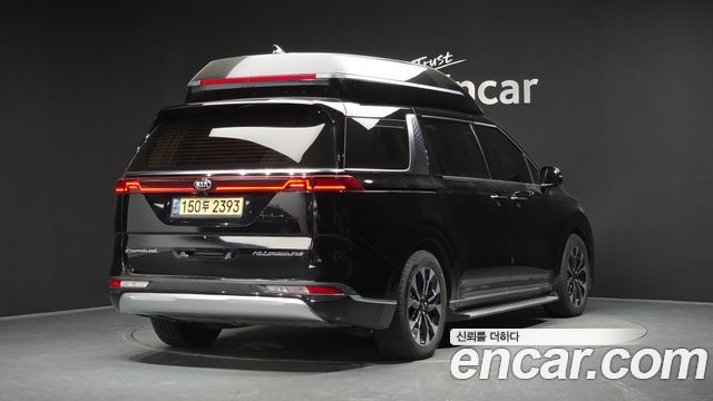 Kia Canival 2021 — photo 2