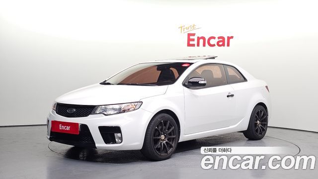 Kia Porte 2010 — photo 1