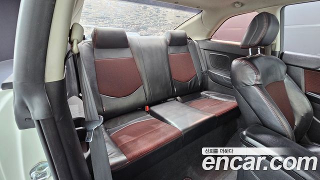 Kia Porte 2010 — photo 12