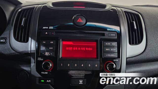 Kia Porte 2010 — photo 16