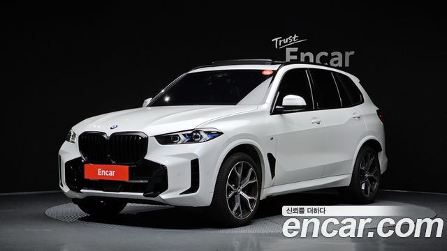 BMW X5 2024 — photo 1