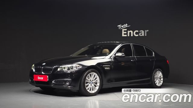 BMW 5-Series 2015 — photo 1