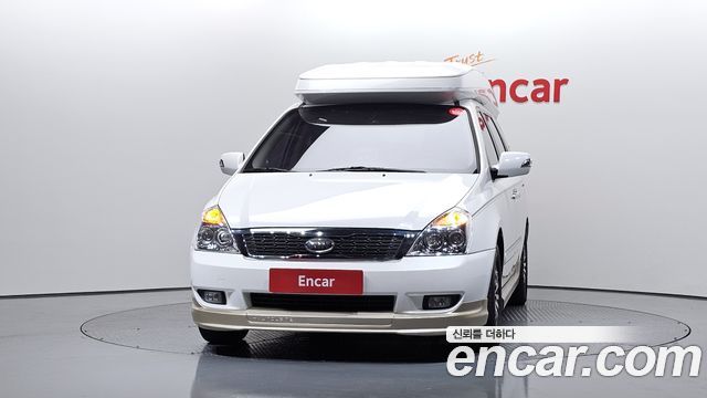 Kia Canival 2012 — photo 3