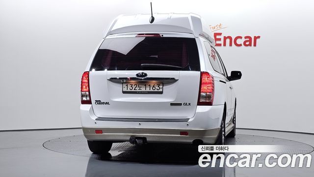 Kia Canival 2012 — photo 4