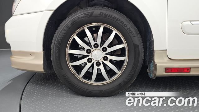 Kia Canival 2012 — photo 5