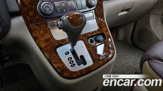 Kia Canival 2012 — photo 12