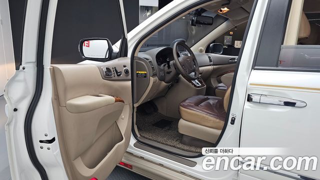 Kia Canival 2012 — photo 13