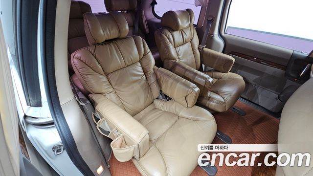 Kia Canival 2012 — photo 17
