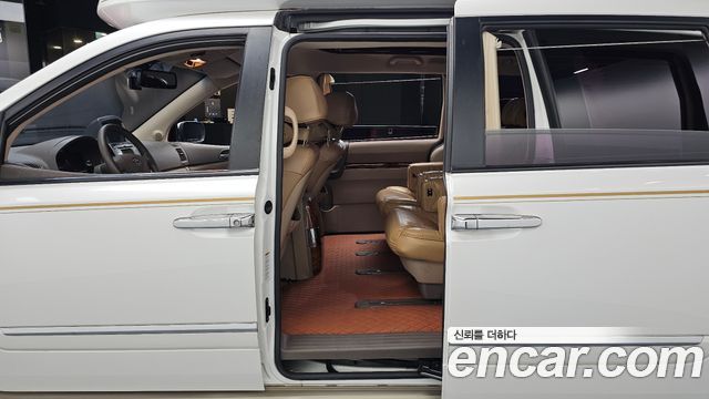 Kia Canival 2012 — photo 18