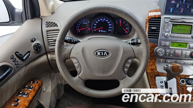 Kia Canival 2012 — photo 19