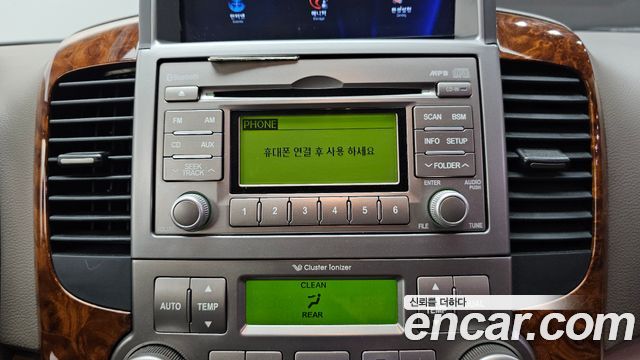 Kia Canival 2012 — photo 21