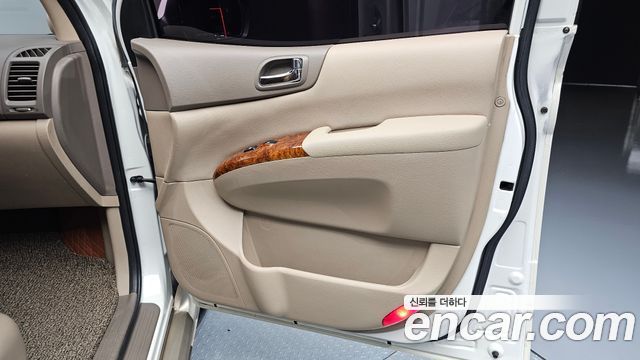 Kia Canival 2012 — photo 15