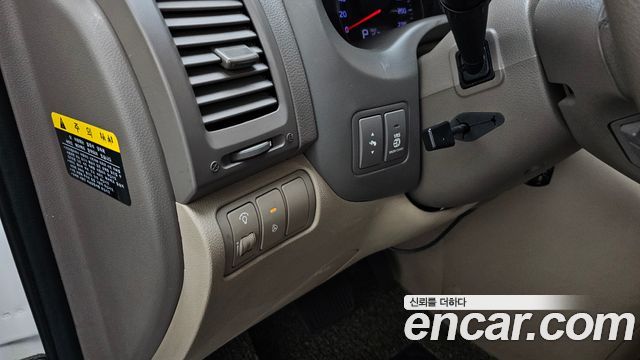 Kia Canival 2012 — photo 28