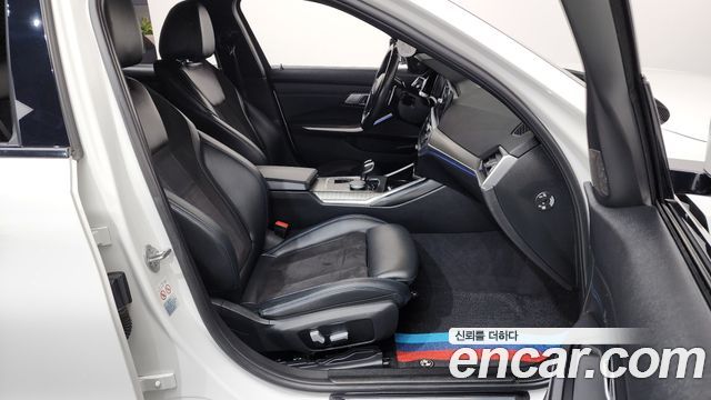 BMW 3-Series 2021 — photo 16