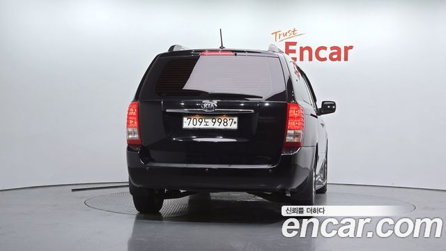 Kia Canival 2013 — photo 4