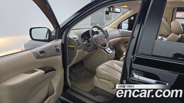 Kia Canival 2013 — photo 13