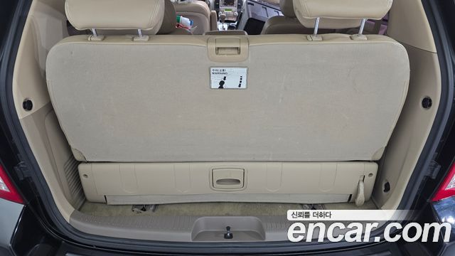 Kia Canival 2013 — photo 22