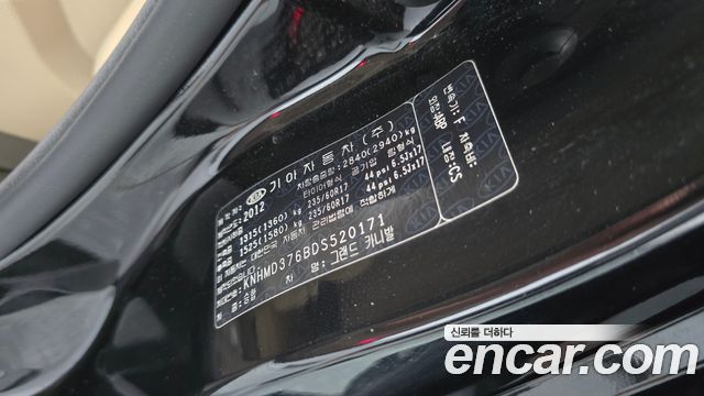 Kia Canival 2013 — photo 24