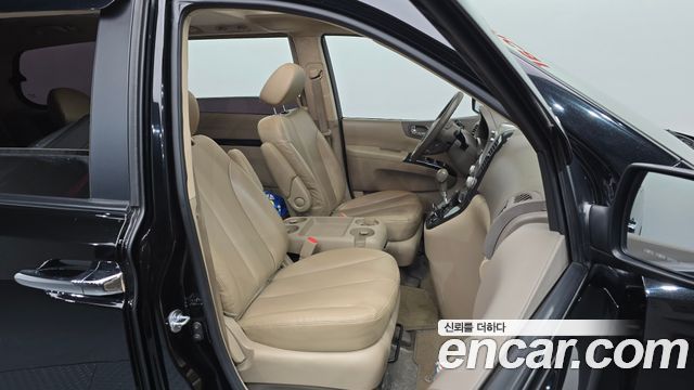 Kia Canival 2013 — photo 16
